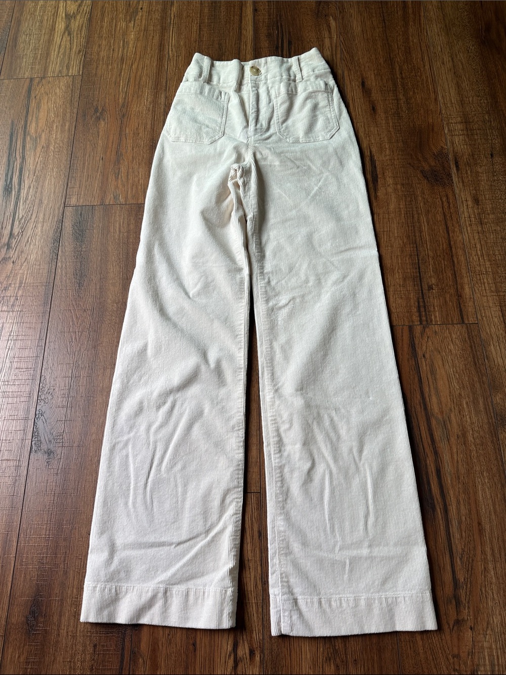 Maeve (by Anthropologie) cream corduroys size 24 tall.